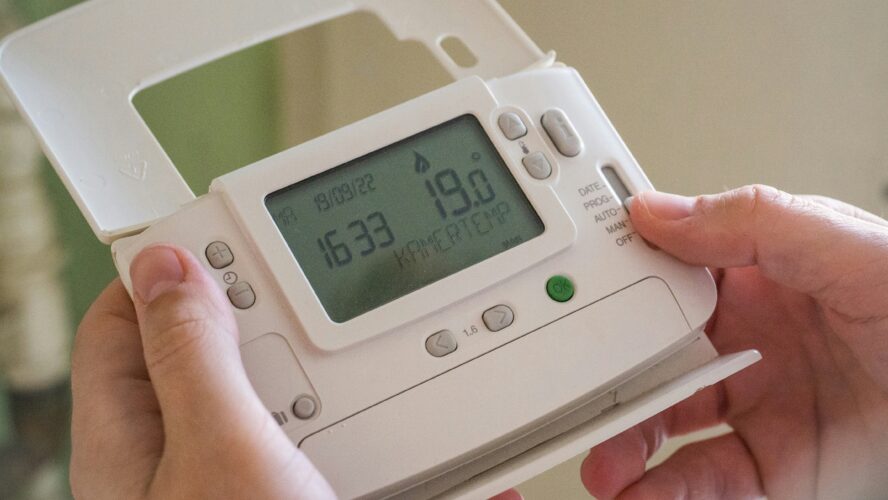 Person using smart thermometer