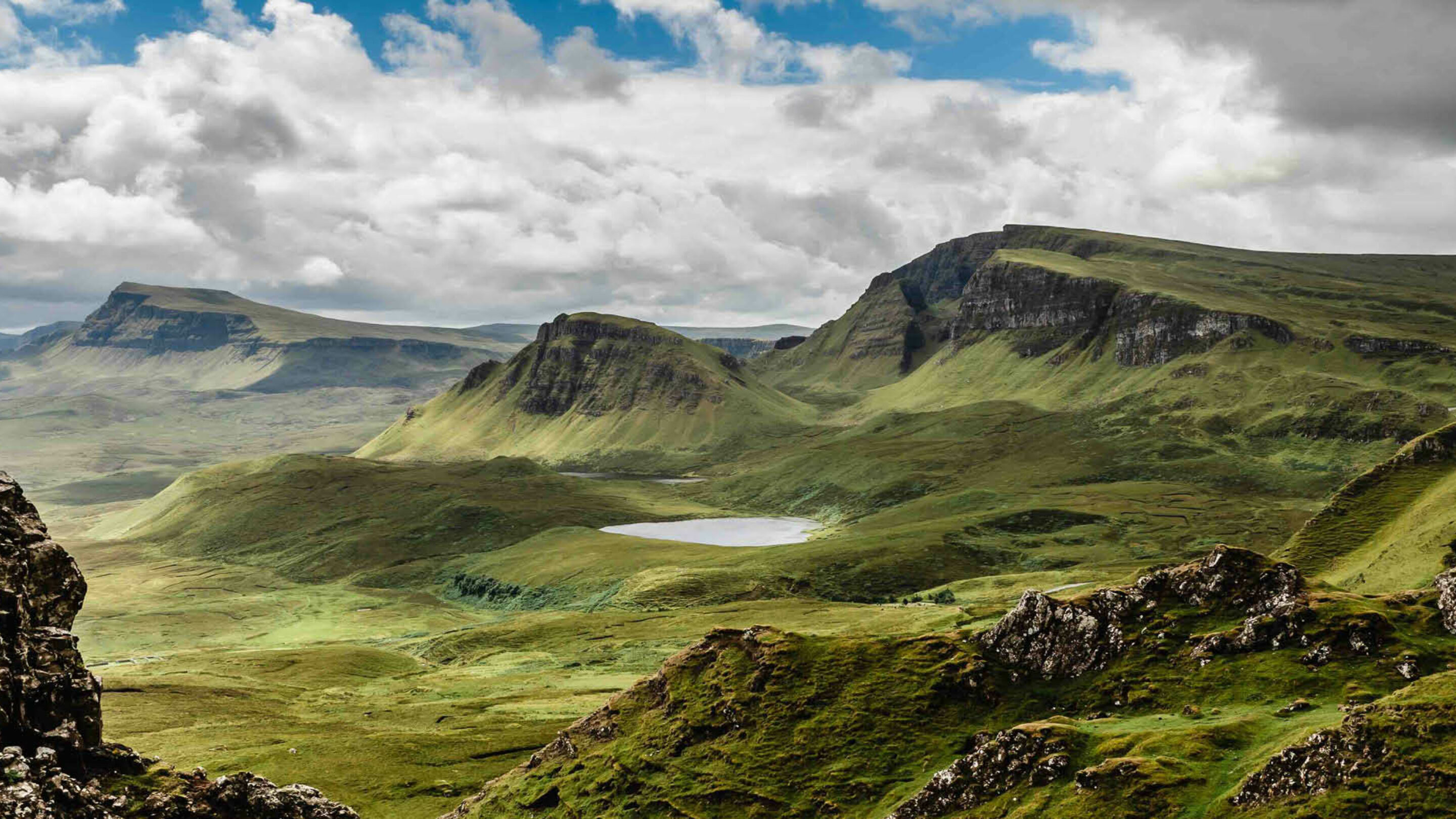 View of mountains and lakes, clouds and a blue sky in the UK