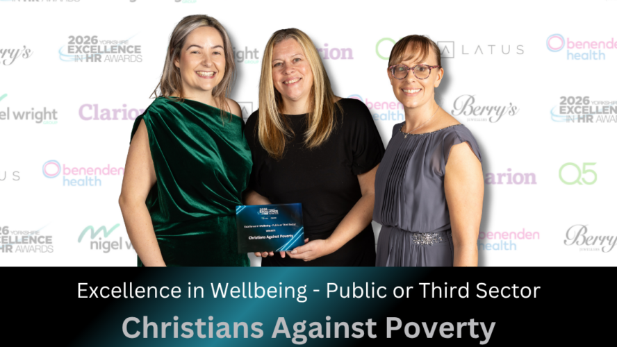 CAP HR staff holding an Excellence in Wellbeing award