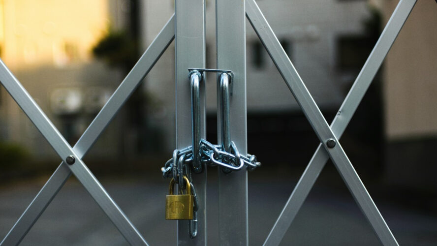 Gate with a padlock