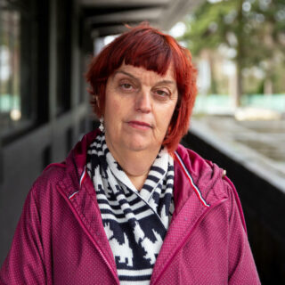 Woman stood facing the camera