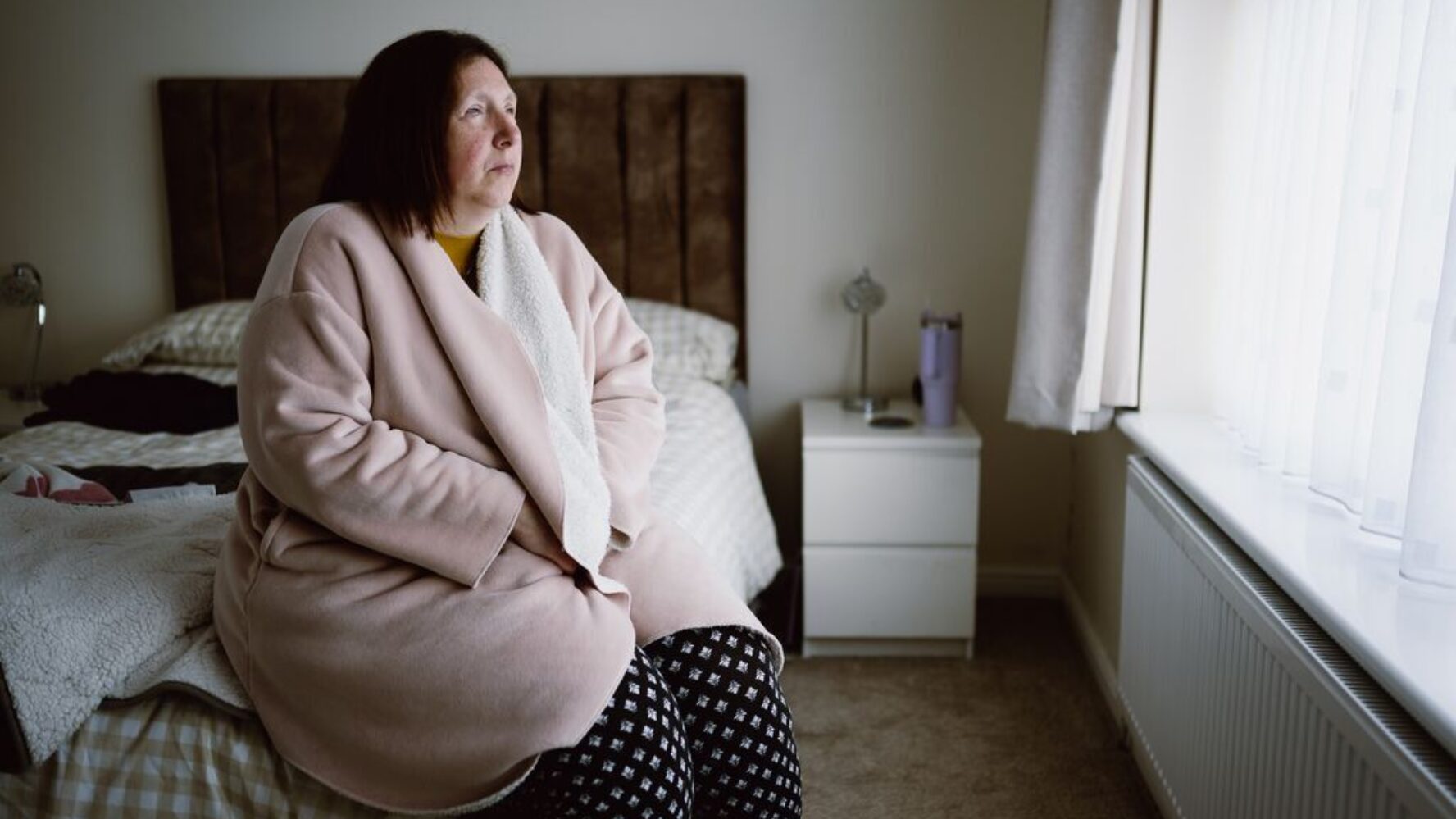 Angela’s sight impairment means she has to spend more time at home, increasing heating and electricity bills.
